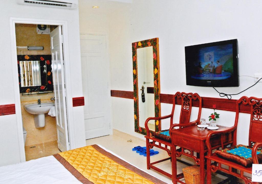 Hoang Thanh Thuy Airport Hotel 1 - Gan Am Thuc Dem Cho Hoang Hoa Tham Ho Chi Minh-Byen Værelse billede